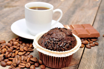 cup of coffee with muffin and chocolate