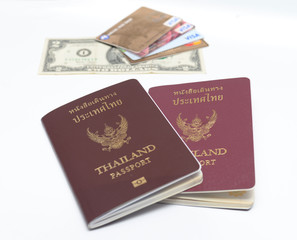 us dollar bills and credit card with Thailand passport