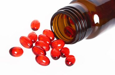 Red pills an pill bottle