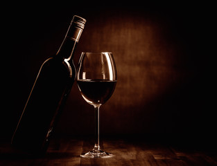 Rew wine bottle and glass