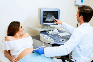 pregnant woman on reception at the doctor