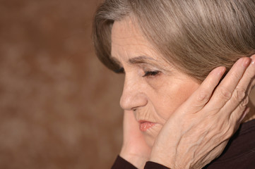 Fototapeta premium Sad elderly woman