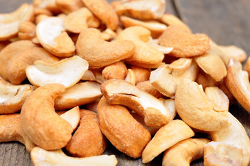cashew nuts on a wooden table