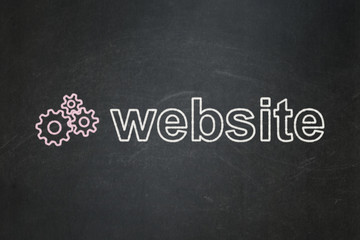 Obraz premium Web development concept: Gears and Website on chalkboard