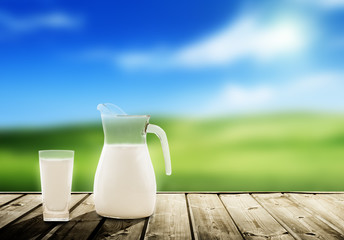 milk and sunny spring field