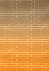 Orange gray brick wall as background or texture