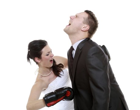 couple expressive fighting. Angry wife boxing husband.