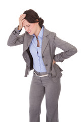 Businesswoman Suffering From Back Pain