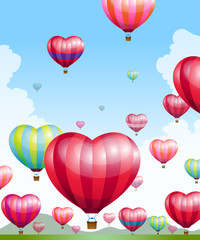 Heart shaped hot air balloons taking off