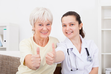 Doctor And Patient Showing Thumb Up