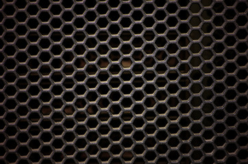 Hexagonal, honey comb stainless steel mesh on black
