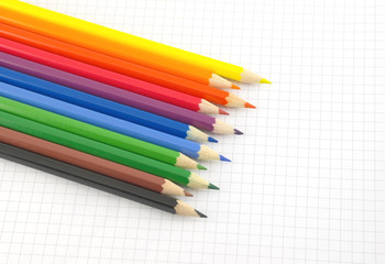 Color pencils on the checked paper