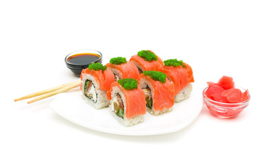 sushi, pickled ginger and soy sauce on a white background