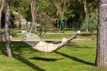 An empty hammock outdoors