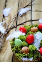 spring branch and basket with eggs