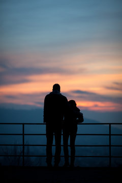 silhouette of couple in sunset