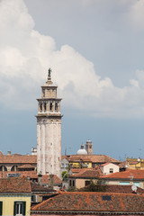 Obraz premium Bell Tower Under Venice Clouds