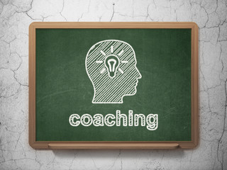 Education concept: Head With Light Bulb and Coaching on