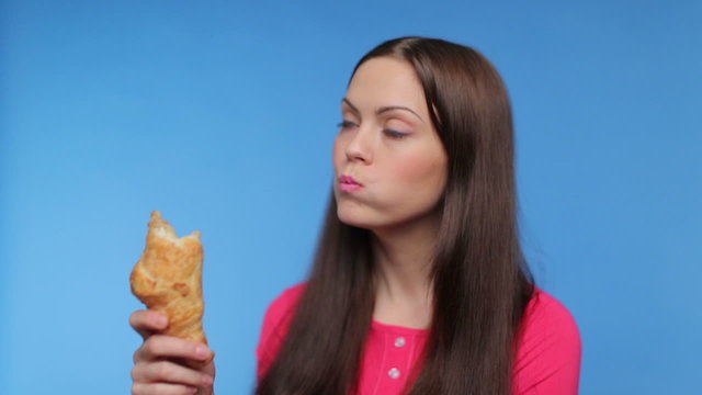 girl eating and smiling