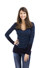 Obraz premium Beautiful woman smiling and standing over a white background