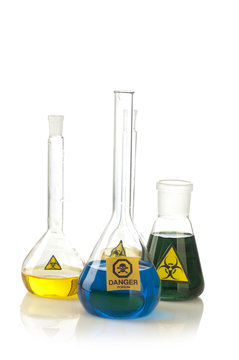 Glass laboratory equipment with symbol biohazard and danger