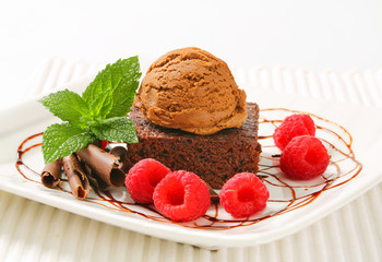 Chocolate Brownie with ice cream and raspberries