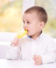 Little boy with lollipop