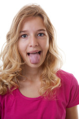 girl makes funny face in closeup over white background