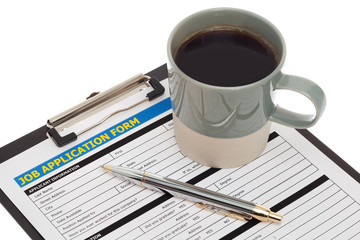 Job application form with coffee cup