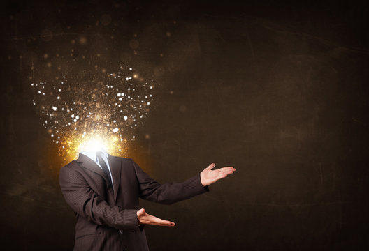 Business man with glowing exploding head