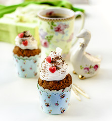 Cupcakes and coffee in Easter or Saint Valentine's Day style