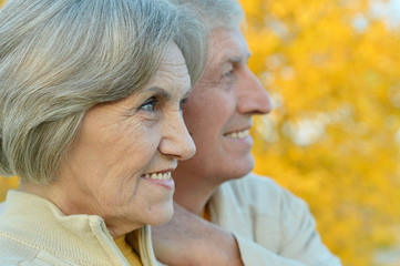 Happy elderly couple at nature