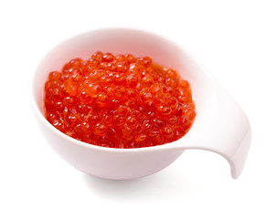 Bowl of red caviar isolated