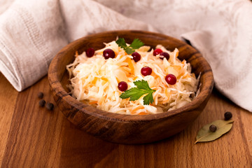 Wooden bowl of sauerkraut
