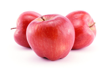 Three red apples