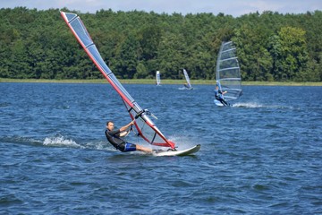 Naklejka premium Windsurfing on the lake Niesłysz, Poland