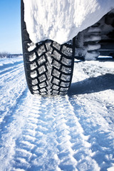 Closeup of car tires in winter
