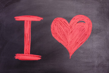 message of the day of love painted on the Board