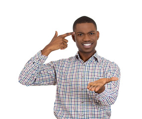 Angry young man asking someone a question are you crazy?