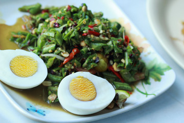 Bean salad with boiled egg, asian spicy salad.