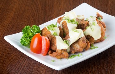 japanese cuisine. fried chicken on the background