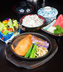 japanese cuisine. hot plate fish on the background