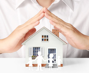 holding house representing home ownership