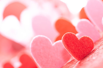 Hearts on red background