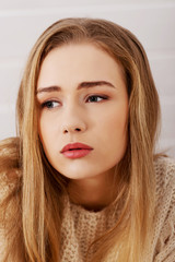 Naklejka premium Portraif of beautiful sad, worried caucasian woman.