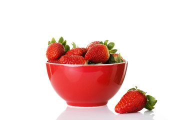 Fresh red strawberries in a bowl.