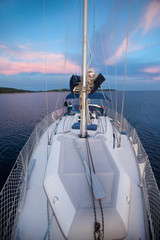 Fototapeta premium Sailboat at sunset