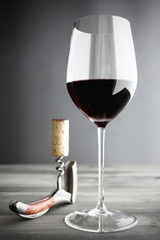 Wine: Glass of Red Wine and Corkscrew