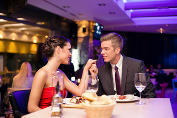 couple exchanged tenderness at restaurant