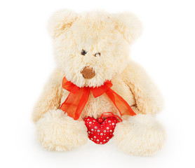 furry bear with a red bow and red heart